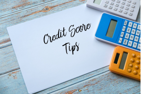 paper with credit score tips text and calculators